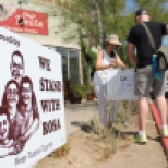 Cecilia Valenzuela Gee, left, and Ryan Tombleson, volunteers with Launching 25 Days with Rosa campaign canvass a neighborhood south of downtown Tucson on Monday, July 13, 2015.